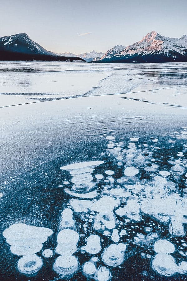 This unique lake in Alberta, Canada, has cool-looking bubbles frozen near the surface. The bubbles are full of frozen methane gas, so quite literally a match could set off an explosion.