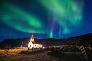 Vik i Myrdal church and the incredible northern lights. Vik i Myrdal Church And Aurora Borealis In Vik, Iceland.