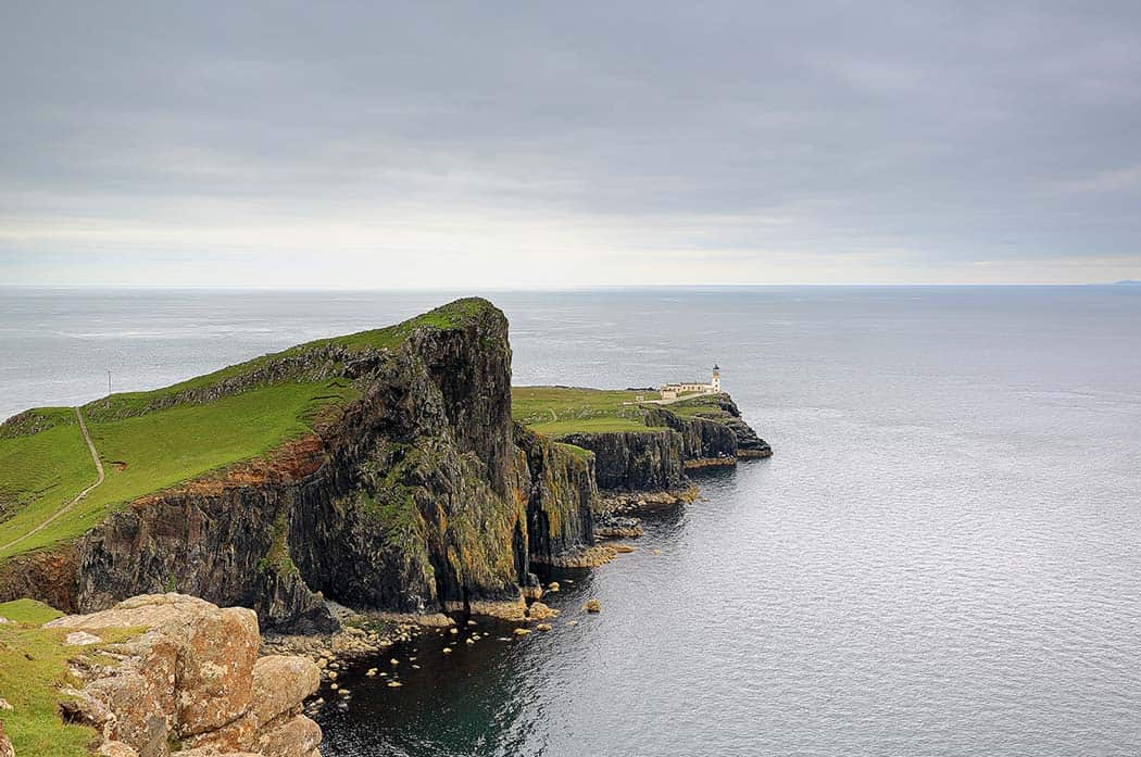 Neist Point Lighthouse and rocky coastline on the Isle of Skye.