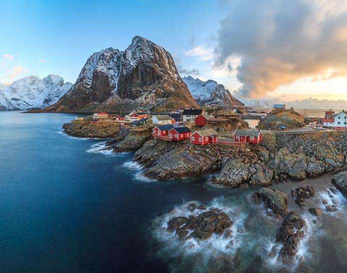 Fishing village of Reine in the Lofoten Islands. Norway is one of the most breathtakingly beautiful countries in the world and these photos prove it! So amazing! Here are some of the top places to see in Norway. #norway #norwayphtoos #norwayphotography #avenlylanetravel #avenlylane #europe #travelinspiration #beautifulplaces 