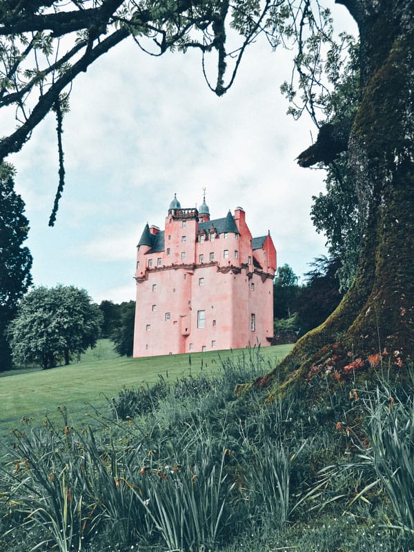 Craigievar Castle in Scotland. One of the best castles in Scotland. Pictures of Scotland you will want to add to your Scotland road trip itinerary! Europe Bucket List - #avenlylanetravel #scotland #travel #scottishhighlands #unitedkingdom #hiking #adventuretravel #adventure #river #outdoors #travelitinerary #roadtrip #scottish - Read the full article at www.avenlylane.com #castles