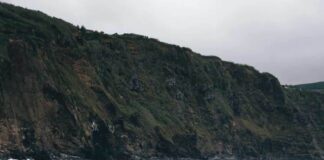 BEST BEACH IN THE AZORES ISLANDS! Mosteiros Beach is so underrated that we had the entire beach to ourselves. This black sand beach is one of the best places to see in the Azores! Don't miss it over at www.avenlylanetravel.com #AVENLYLANE #AVENLYLANETRAVEL #azores #beautifulplaces #travelguide