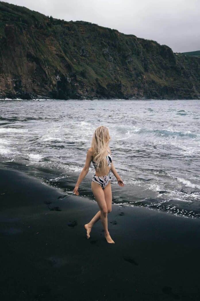 BEST BEACH IN THE AZORES ISLANDS! Mosteiros Beach is so underrated that we had the entire beach to ourselves. This black sand beach is one of the best places to see in the Azores! Don't miss it over at www.avenlylanetravel.com #AVENLYLANE #AVENLYLANETRAVEL #azores #beautifulplaces #travelguide