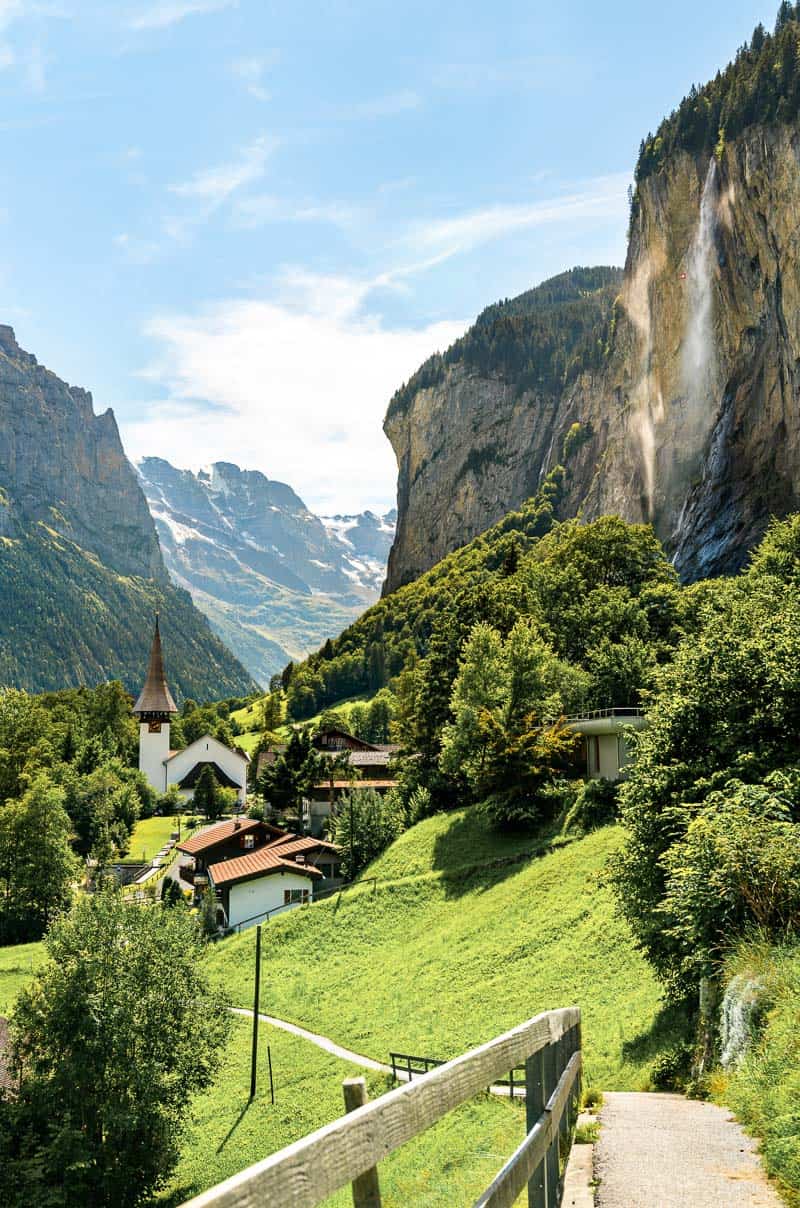 The church and the Staubbach Falls in Lauterbrunnen, Switzerland