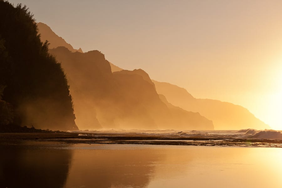 Na Pali coast by Ke'e beach in Kauai at sunset