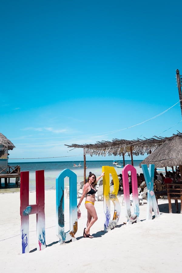 Taking photos at the famous Holbox sign