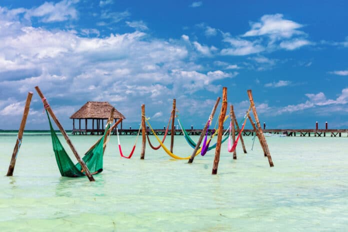 Playa Punta Cocos Hammocks in the water at Punta Cocos, Isla Holbox, Mexico