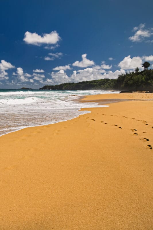 Secret Beach or Kauapea Beach on the north shore of Kauai, Hawaii.